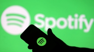Spotify mengerjakan alat AI dengan label musik besar